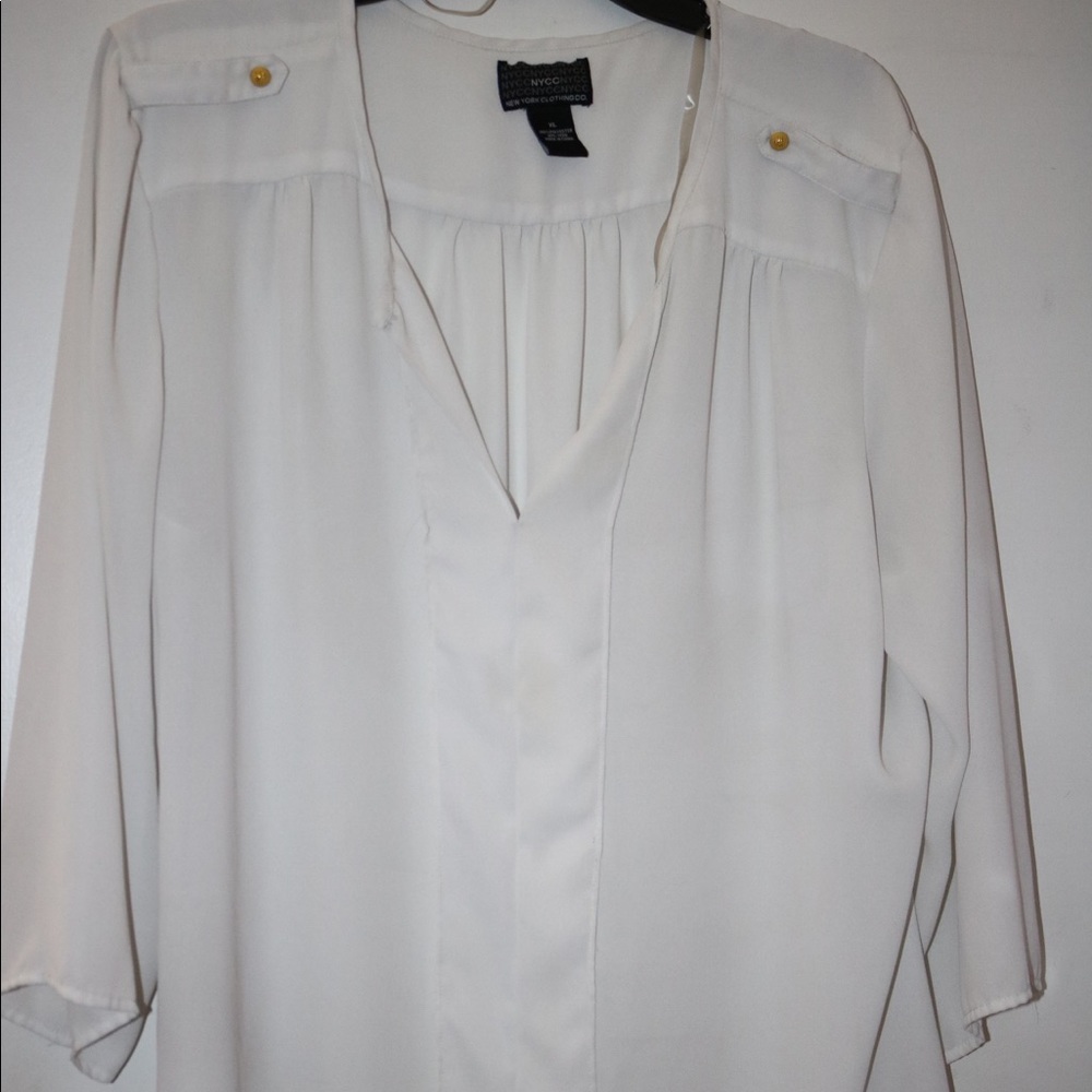 3 different white blouses